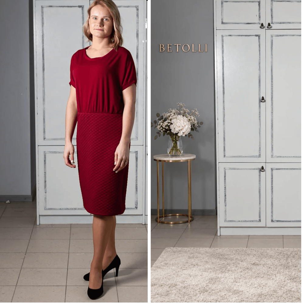 Model wearing the BETOLLI Emma burgundy dress with short sleeves, a draped jersey top, defined waist and fitted quilted pencil skirt.