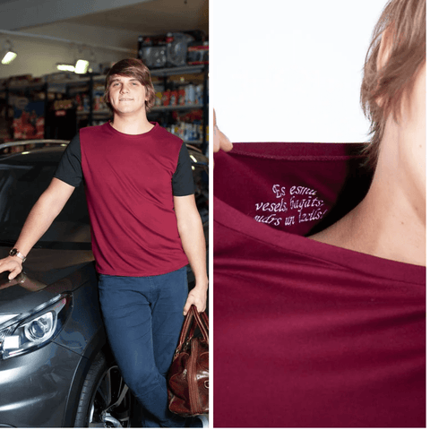 BETOLLI men’s burgundy T-shirt with black short sleeves, shown on a model beside a close-up of hidden affirmation embroidery inside the back neckline.