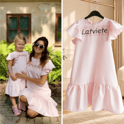 BETOLLI Latviete Pink embroidered women’s dress with flutter sleeves and a ruffle hem, pictured alongside a matching child’s dress.