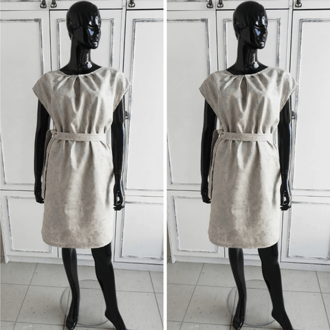 BETOLLI Natural beige linen dress with cap sleeves, neckline pleats, a matching waist belt and subtle silver-tone print, displayed on a mannequin.